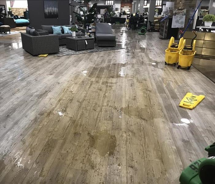 Furniture store water leak on floor