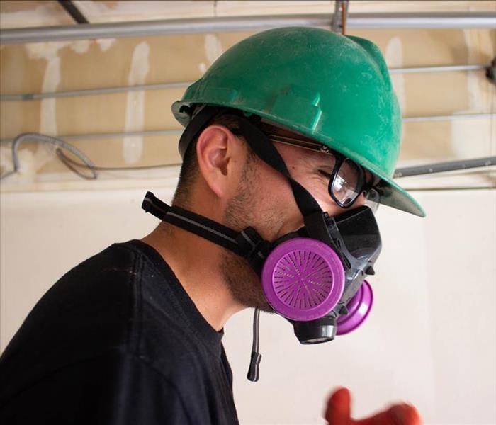 Production Technician wearing face mask