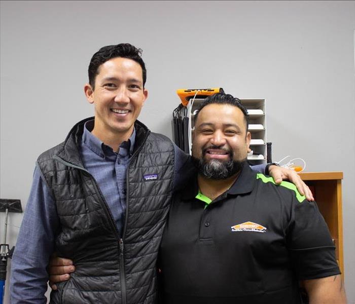 Two male SERVPRO San Diego East employees posing for a birthday picture
