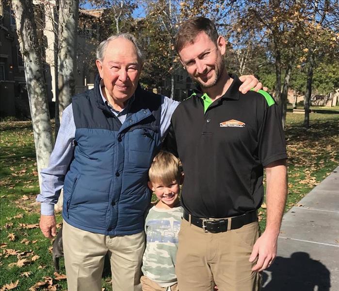 SERVPRO of San Diego East co owner posing with his father and son