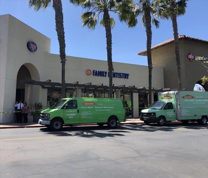 SERVPRO vehicles waiting to unload equipment